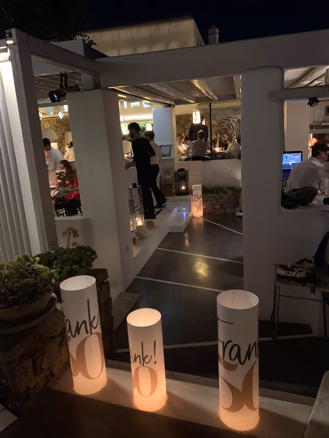 Personalized candle lanterns welcoming guests to a Krama celebration