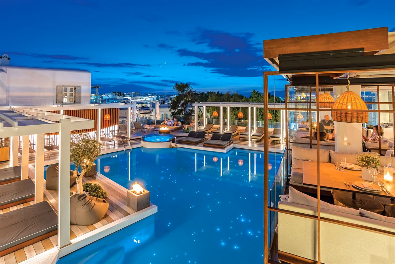 Krama rooftop pool at twilight, Mykonos Town